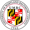 The University of Maryland, Baltimore County seal featuring the Maryland state flag and the initials UMBC. Established in 1966.