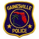 Gainesville Police patch with a palm tree, state of Florida outline, and two stars.
